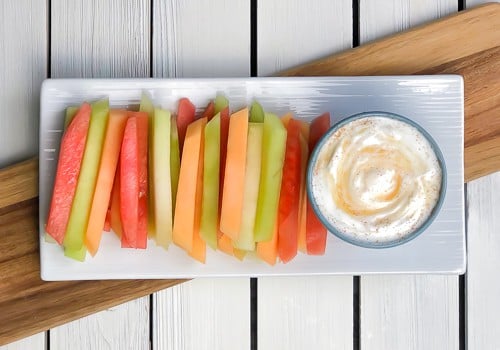 Fruit dippers or sticks served with an easy coconut Greek yogurt dip! A great healthy dessert for any party!