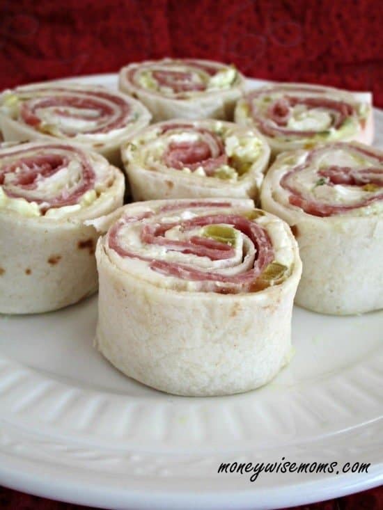 pinwheels stuffed with ham and cheese on a dish