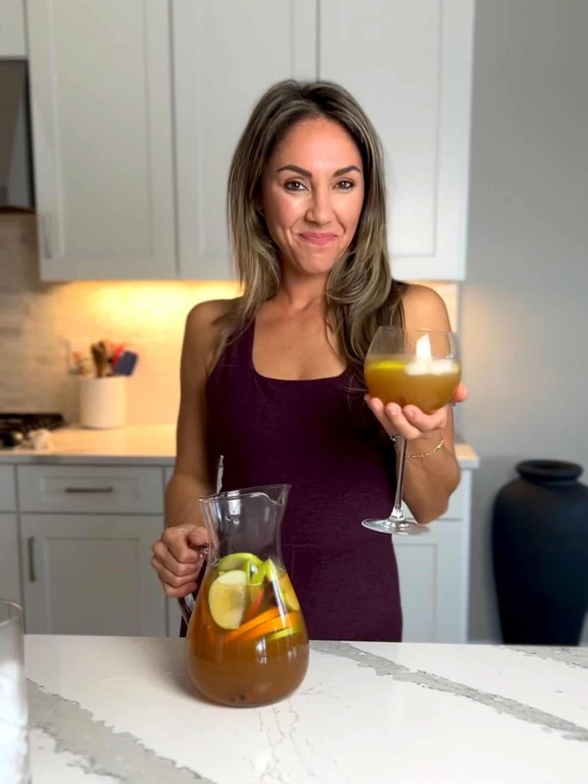 Aleka ready to party with a sangria in hand.